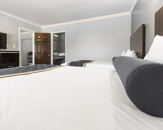 Hollywood Palms Inn and Suites - Los Angeles - Bedroom