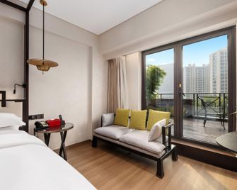 Jundu Boutique Hotel (Jinhua High Speed Railway Station) - Jinhua - Κρεβατοκάμαρα