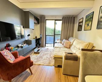 Loft Cama King 3 min do centrinho - Campos do Jordao - Wohnzimmer
