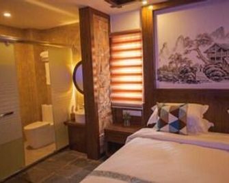 The Longmen One Inn - Zhangjiajie - Bedroom