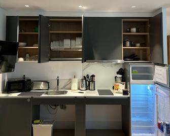 Apartamentos Turísticos La Plaza - Chipiona - Kitchen
