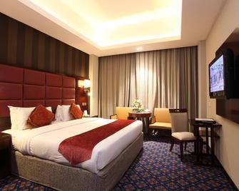 Ramee Guestline Hotel Qurum - มัสกัต - ห้องนอน