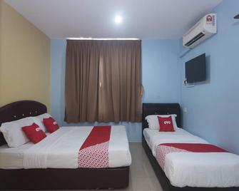 OYO 44016 Rafik Ali Motel - Kepala Batas - Bedroom