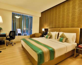 T24 Residency Mumbai International Airport Hotel - Mumbai - Bedroom