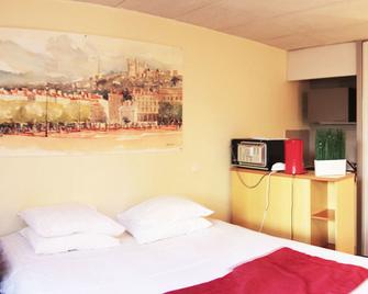 Quadraverde - ليون - غرفة نوم