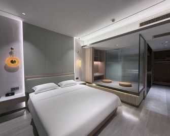 Lequanji Kela Hotel - Suizhou - Спальня