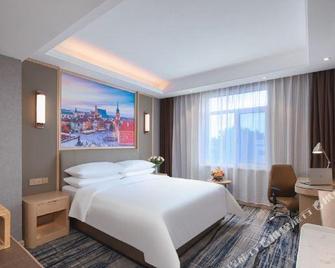 Vienna International Hotel(Qingdao Liuting Airport High Speed Railway North Station) - Qingdao - Bedroom