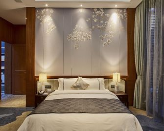 Spring Posh Roadsun International Hotel & Resort - Zhangjiajie - Bedroom