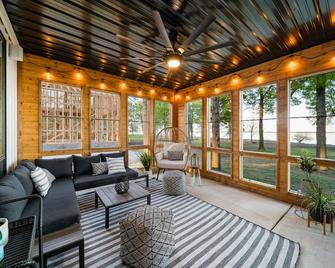 Gorgeous Monkey Island Lakefront Getaway with In-Ground Swim Spa! - Afton - Living room