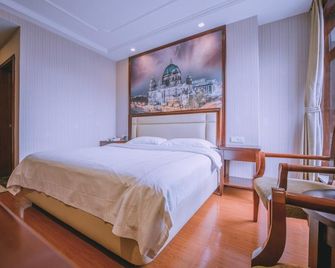 GreenTree Inn Jiaxing Zhapu jiulong Mountain Express Hotel - Jiaxing - Bedroom