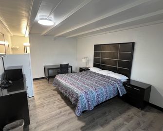 Economy Inn - Kankakee - Bedroom