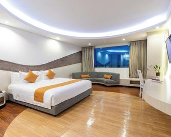 Aston Cirebon Hotel And Convention Center - Cirebon - Bedroom