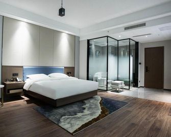 Windsor King Hotel - Rizhao - Slaapkamer