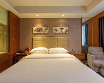 Longman International Hotel - Enshi - Bedroom