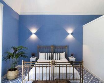 Crudo Home - Pompei - Camera da letto