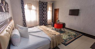 Sinai Suites Hotel - Kigali - Habitación