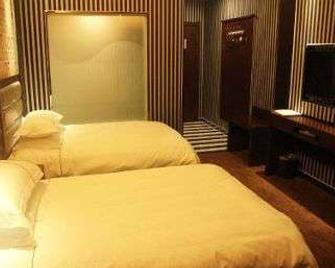Super 8 by Wyndham Urumqi Airport Ji Chang Bei Qu - Ürümqi - Habitación