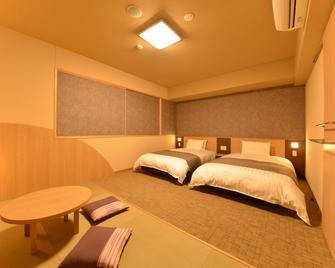 دورمي إن تاكاماتسو تشو كوين ماي ناتشورال هوت سبرينج - تاكاماتسو - غرفة نوم