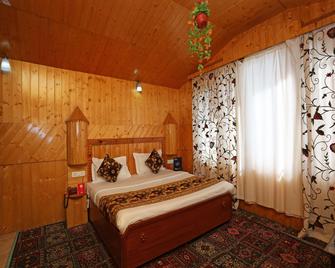OYO 9084 Hotel Tourist Palace - Pahalgam - Ložnice
