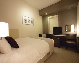 Hotel Trusty Kobe Kyukyoryuchi - Kobe - Bedroom