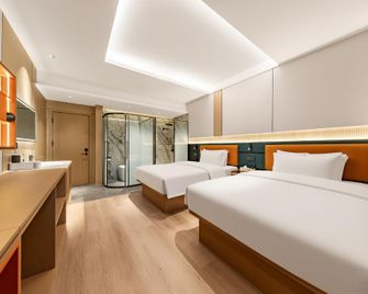 Mingyang Hotel (Government Affairs Center Branch) - Kuang-jüan - Ložnice