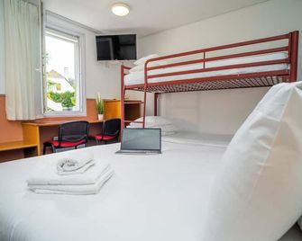 Quick Palace Pau - פו - חדר שינה