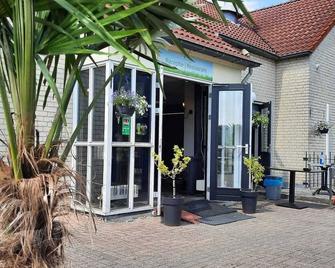 Comfortabel 6p vakantiehuis met laadpaal - Slijk-Ewijk - Edificio