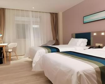 Home Inn Style Jining Wanda Plaza Railway Station - Jining - Schlafzimmer
