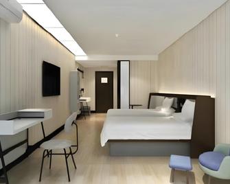 Hanting Hotel Nanchang Bayi Square Fuzhou Road - Nanchang - Bedroom