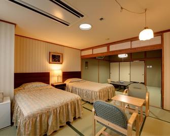 Miyako Hotel Sawadaya - Miyako - Ložnice