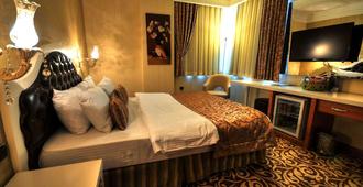 Golden Deluxe Hotel - Adana - Yatak Odası