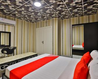 Al-Nabares Palace Apartment Hotel - Jeddah - Bedroom