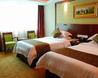 Vienna Hotel Nanchang Hongcheng - נאנצ'אנג - חדר שינה