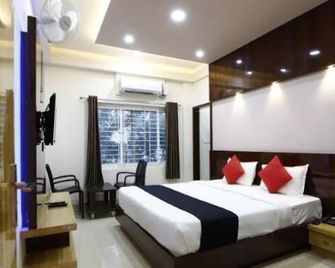 Royal blue meridian inn - Bengaluru - Bedroom