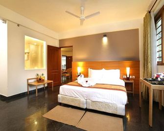 فندق بيبرفين - ثيكادي - غرفة نوم