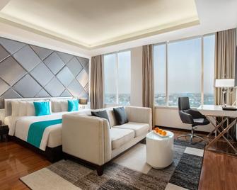 The Alana Hotel & Convention Center Solo By Aston - Surakarta City - Bedroom