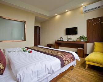 Huangshan North Station Huiting Boutique Hostel - Huangshan - Chambre