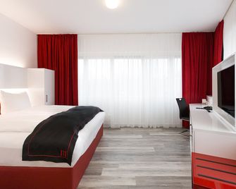 دورميرو هوتل هانوفر – لانغنهاغن أيربورت - هانوفر - غرفة نوم