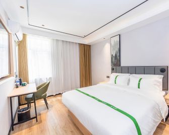 Greentree Inn Qingdao Licang Shuyan Road Daweng Square Express Hotel - Qingdao - Habitación