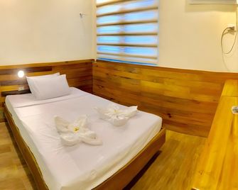 Two Seasons Executive Suites - Zamboanga City - Habitación