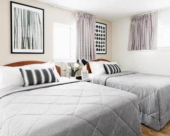 Intown Suites Extended Stay Jacksonville Fl St Johns Bluff Rd - Jacksonville - Bedroom