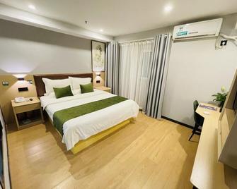 Greentree Inn Anhui Suzhou Baima Mall Express Hotel - Suzhou - Спальня