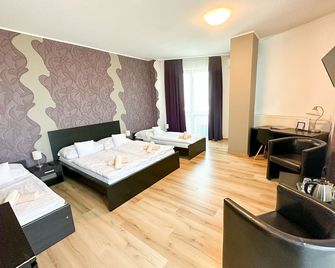 هوتل مودينا - براتيسلافا - غرفة نوم