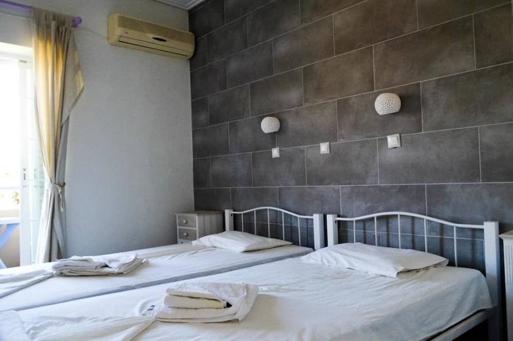 Sevi Apartments - كيفالوس - غرفة نوم