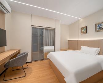 Guangzhou Yide Hotel - Guangzhou - Bedroom