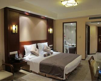 Xuzhou Han Garden Hotel - Xuzhou - Спальня