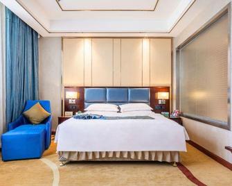 Hualong Hotel - Aksu - Habitación