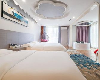 Kunming Qiyin Hotel (920 Hospital Daguan Zhuanxin Farmers' Market) - Kunming - Makuuhuone