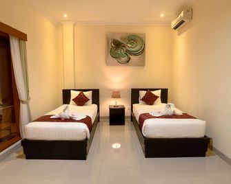 Tom's Inn Pecatu - South Kuta - Schlafzimmer