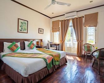 Residence Sisouk Boutique Hotel - Pakse - Habitació